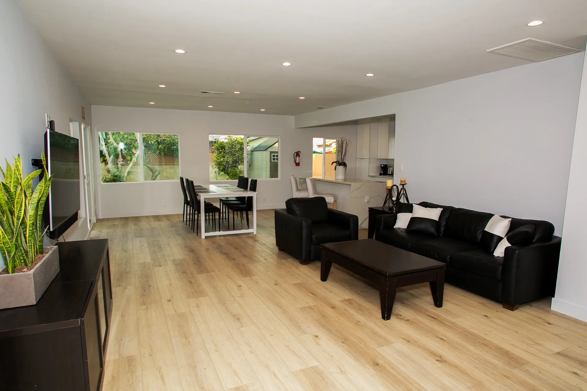Sunlit common living room at Archwood